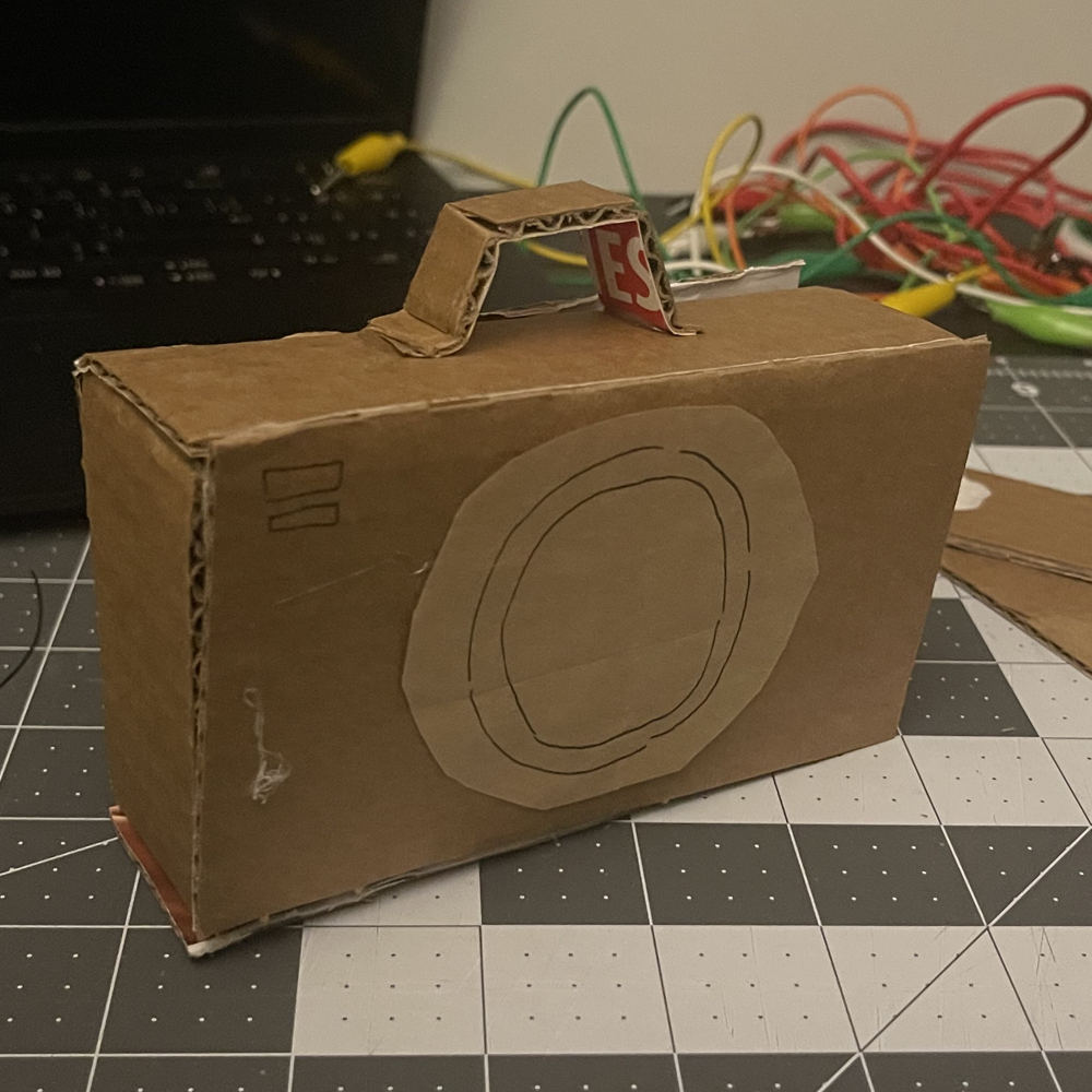 This is the front of the camera prototype. I put in a lense with some paper bag just for orientation purposes. Also so it looks like a camera.