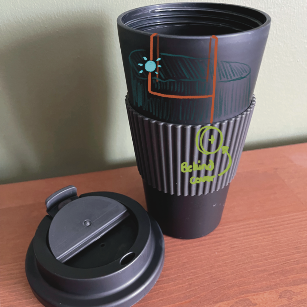 This is the planned out version of the coffee cup. I would put the battery inside the coffee cup holder so it's secure. Then, I would get my copper tape and wrap it around so both positive and negative ends are inside the mug. 
